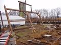 Camp Barn Frame Dismantle / A bent being laid down